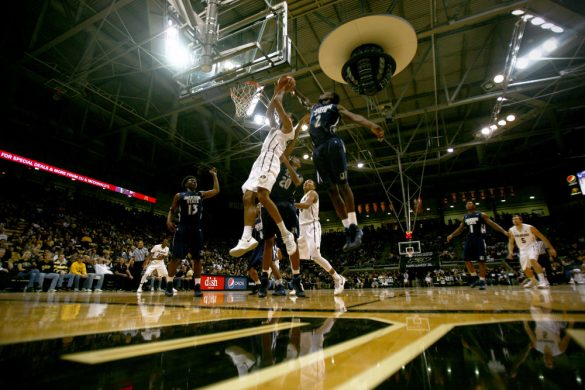 Guard Spencer Dinwiddie takes a shot during the first half of Colorado's 94-70 win over Jackson State. Dinwiddie finished with 11 points. (James Bradbury/CU Independent)