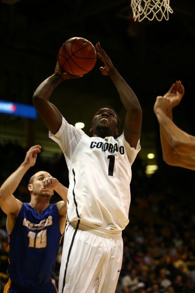Freshman forward Wesley Gordon (1) jumps for a lay-up. (Kai Casey/CU Independent)