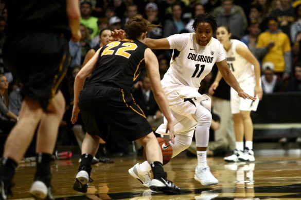 Brittany Wilson (11) gets crossed-up as she defends Samantha Logic (22) near the end of the game. (Kai Casey/CU Independent)