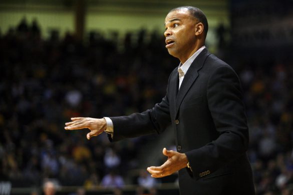 Harvard head coach Tommy Amaker talks to one of his players. (Kai Casey/CU Independent)
