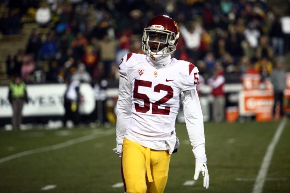USC linebacker Quinton Powell (52) celebrates after USC forced a fumble. (James Bradbury/CU Independent)