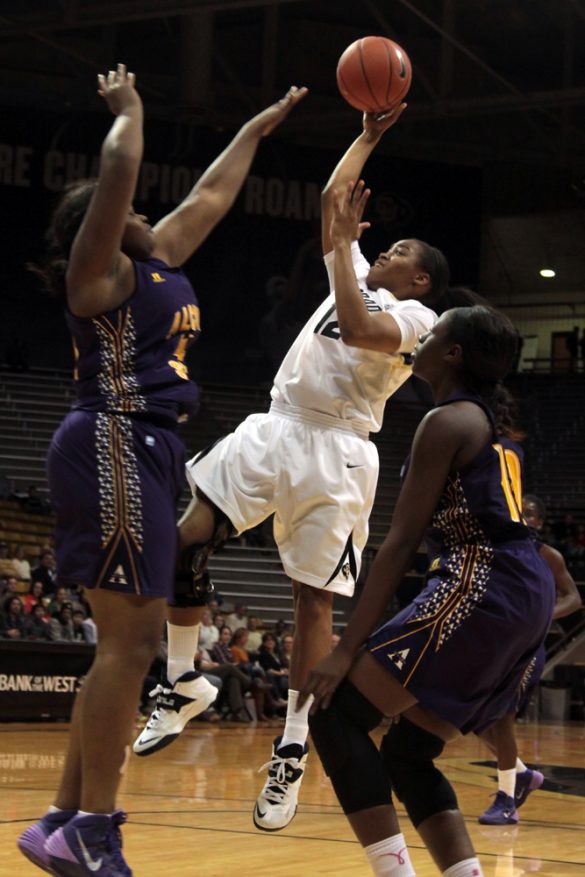 Senior guard Ashley Wilson drives in for a layup against Alcorn State defenders. (Matt Sisneros/CU Independent)