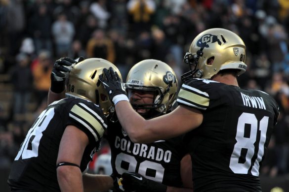 Junior tight end Kyle Slavin (88) celebrates with teammates after his touchdown at the beginning of the second quarter. (Matt Sisneros/CU Independent)