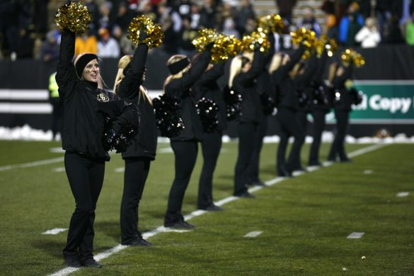 CU cheerleaders pump up the crowd prior to the game. (Nate Bruzdzinski/CU Independent)