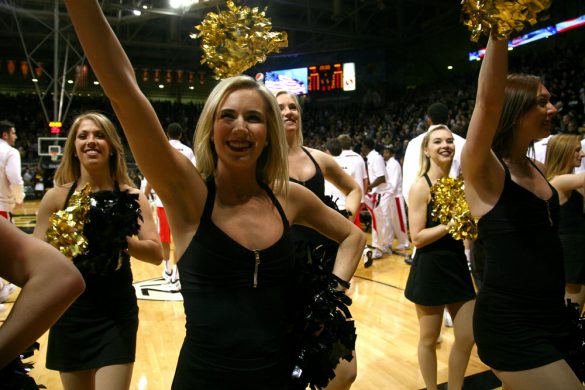 Colorado cheerleaders perform before an NCAA men's basketball game between Colorado and Georgia, Saturday, Dec. 28, 2013, at the Coors Events Center in Boulder, Colo. (Kai Casey/CU Independent)
