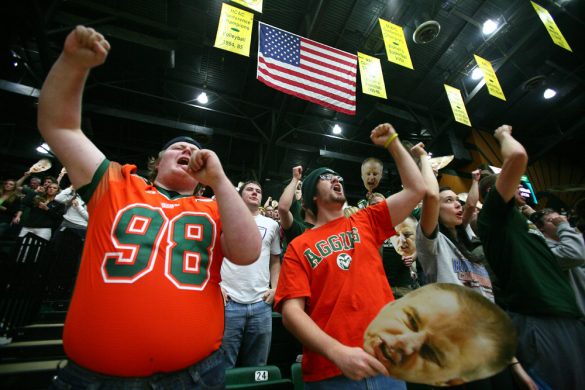 Members of the Ram Ruckus sing the CSU fight song before an NCAA men's basketball game between Colorado and Colorado State, Tuesday, Dec. 3, 2013, at Moby Arena in Fort Collins, Colo. (Kai Casey/CU Independent)