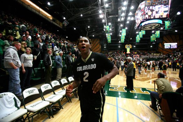 Sophomore forward Xavier Johnson (2) cheers as he leaves the court after defeating Colorado State 67-62. (Kai Casey/CU Independent)