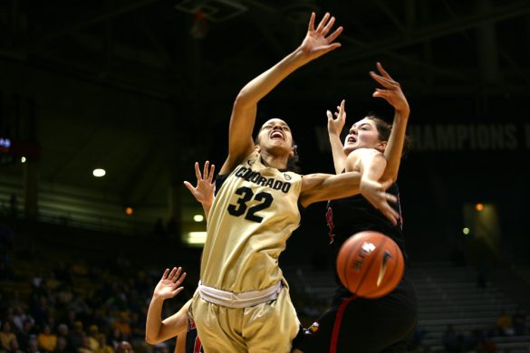 Colorado forward Arielle Roberson (32) reacts after being fouled by Brenna Gates (52). (Kai Casey/CU Independent)