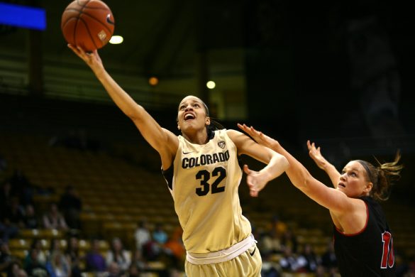 Colorado's Arielle Roberson (32) puts up a layup past Southern Utah's Carli Moreland (15). (Kai Casey/CU Independent)