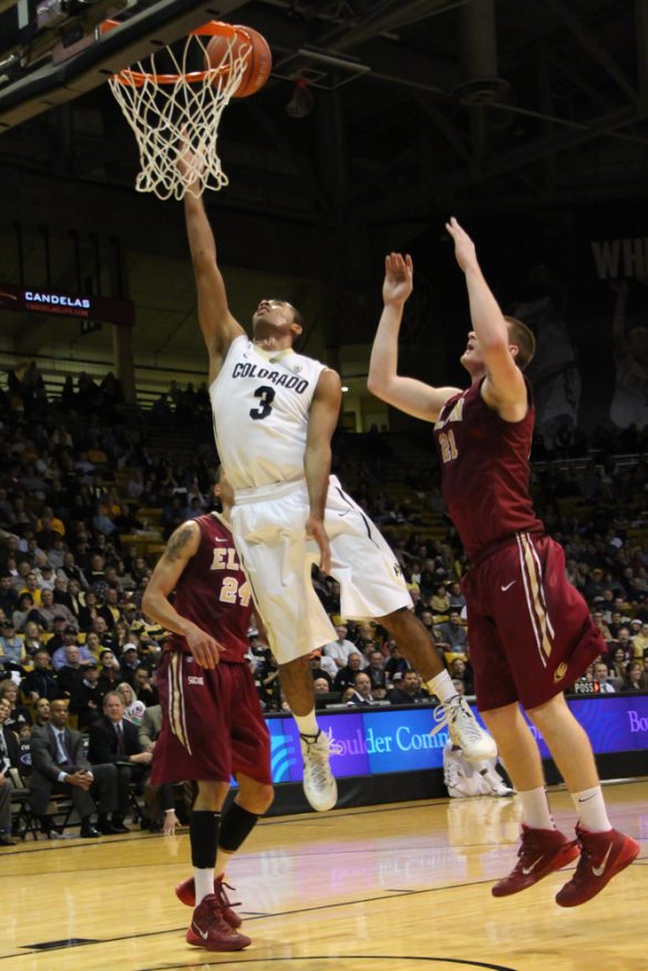 Xavier Talton (3) jumps above an Elon defender to score Friday, Dec. 13, 2013 in Boulder, Colo. (Gray Bender/CU Independent)