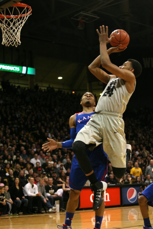 George King (24) drives to the rim during the first half against Kansas. (Nate Bruzdzinski/CU Independent)