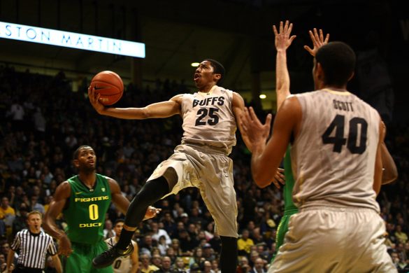 Colorado junior guard Spencer Dinwiddie (25) flies for a layup as Colorado's Johs Scott (40) and Oregon's Mike Moser (0) watch. (Kai Casey/CU Independent)