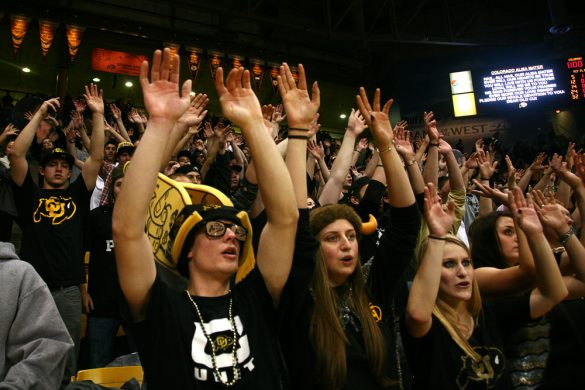Members of the C-Unit wave their hands while singing the alma mater after the No. 20 Colorado Buffaloes defeated the No. 10 Oregon Ducks. (Kai Casey/CU Independent)