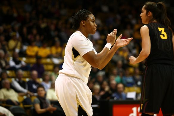 Colorado senior guard Brittany Wilson (11) claps in celebration of a call fouled on Arizona State's Joy Burke (3). (Kai Casey/CU Independent)