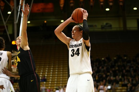 Colorado junior forward Jen Reese (34) shoots a mid-range jumper past the reach of Arizona State's Kelsey Moos (24). (Kai Casey/CU Independent)