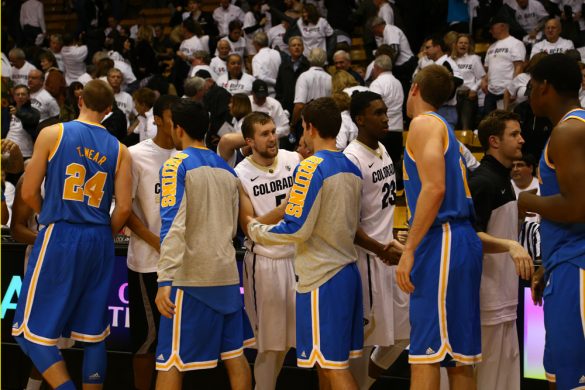 CU and UCLA players congratulate each other on a good game. UCLA defeated CU 69-56. (Nigel Amstock/CU Independent)