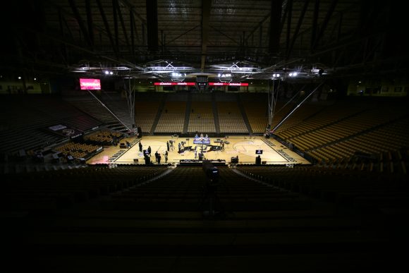 ESPN crew set up the College GameDay set at the Coors Events Center. (Kai Casey/CU Independent)