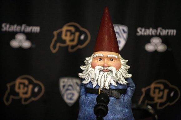 The Travelocity Gnome fields questions during a mock press conference for the ESPN College GameDay broadcast at the Coors Events Center, Saturday, Feb. 22, 2014, in Boulder, Colo. (Kai Casey/CU Independent)