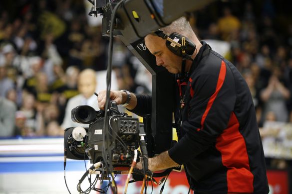 David Barnes adjusts his camera on the end of a jimmy jib during the ESPN College GameDay broadcast at the Coors Events Center, Saturday, Feb. 22, 2014, in Boulder, Colo. (Kai Casey/CU Independent)