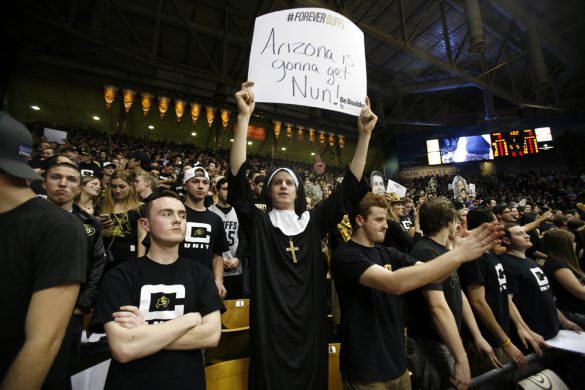 A Colorado fan holds up a sign for the Wildcats during an NCAA college basketball game between the Colorado Buffaloes and the No. 4 Arizona Wildcats at the Coors Events Center, Saturday, Feb. 22, 2014, in Boulder, Colo. (Kai Casey/CU Independent)