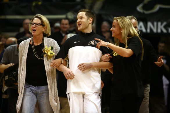 Colorado senior guard Beau Gamble walks out with his mom and sister on Senior Day during an NCAA college basketball game between the Colorado Buffaloes and the No. 4 Arizona Wildcats at the Coors Events Center, Saturday, Feb. 22, 2014, in Boulder, Colo. (Kai Casey/CU Independent)