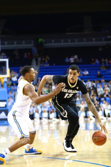 Colorado forward Dustin Thomas drives past a UCLA defender early in the first half at Pauley Pavilion. (Nigel Amstock/CU Independent)