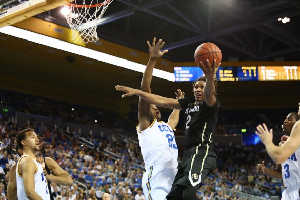 Colorado Forward Xavier Johnson lobs the ball toward the UCLA basket in the second half of play at Pauley Pavilion. (Nigel Amstock/CU Independent)