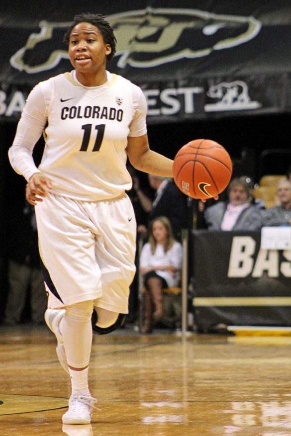Colorado senior Brittany Wilson runs the ball down the court during the Colorado and Washington State game Sunday, Feb. 16, 2014, at Coors Event Center in Boulder, Colo. Wilson contributed five points towards the team's total of 77. (Maddie Shumway/CU Independent)