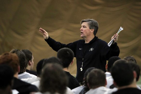 Head coach Mike MacIntyre addresses the team at the end of practice on March 7, 2014. (Matt Sisneros/CU Independent)