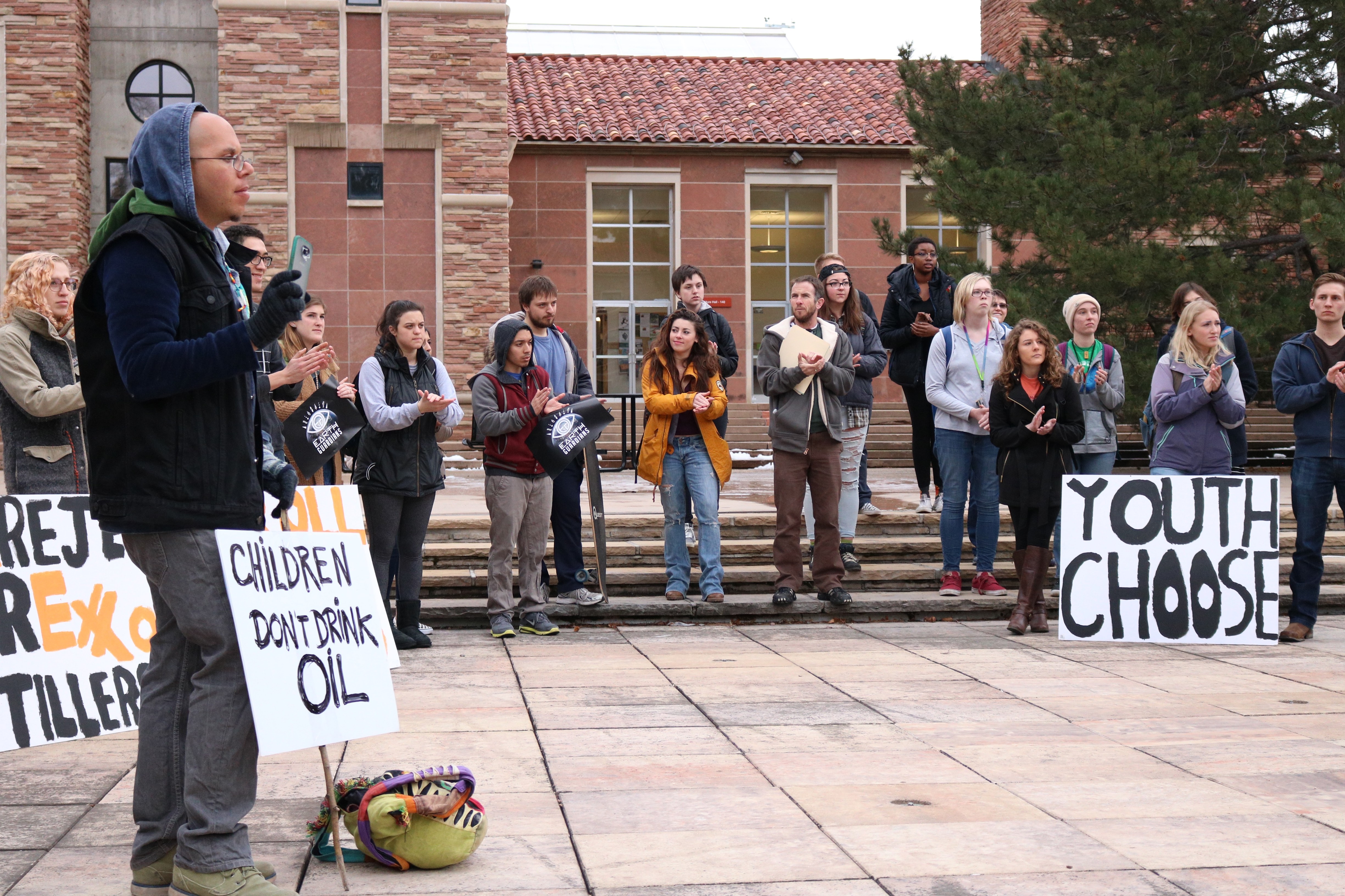 Environmental activists walk out of class to rally at UMC