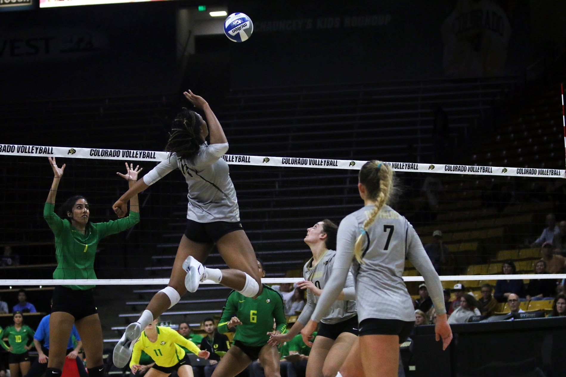 Buffaloes take down No. 12 Oregon in four sets