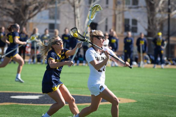 Wolverines claw the Buffs, 8-6