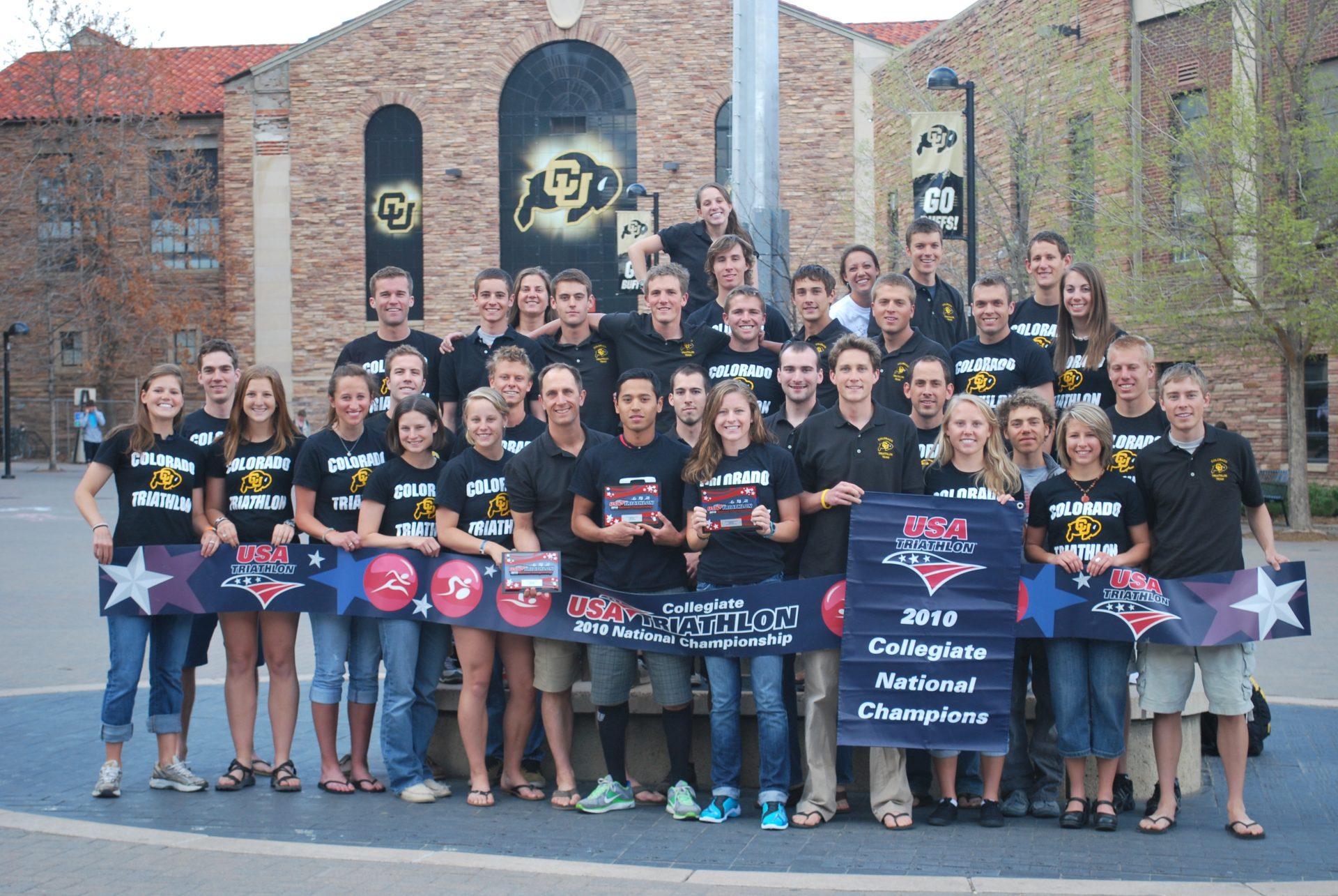 Colorado triathlon team running, biking, swimming in the right direction
