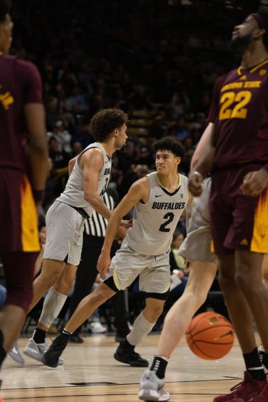 Sophomore KJ Simpson celebrates after hitting a three-point shot during the first half at the CU Events Center. Dec. 1, 2022. (Kara Wagenknecht/The CU Independent)
