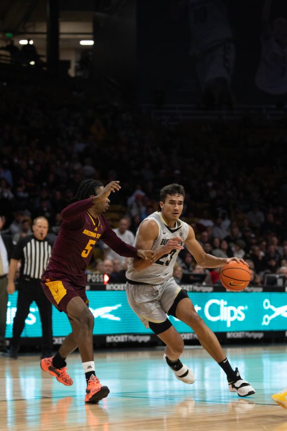 Junior forward Tristan da Silva drives to the basket during the second half at the CU Events Center. Da Silva finished the night with 10 points. Dec. 1, 2022. (Kara Wagenknecht/The CU Independent)