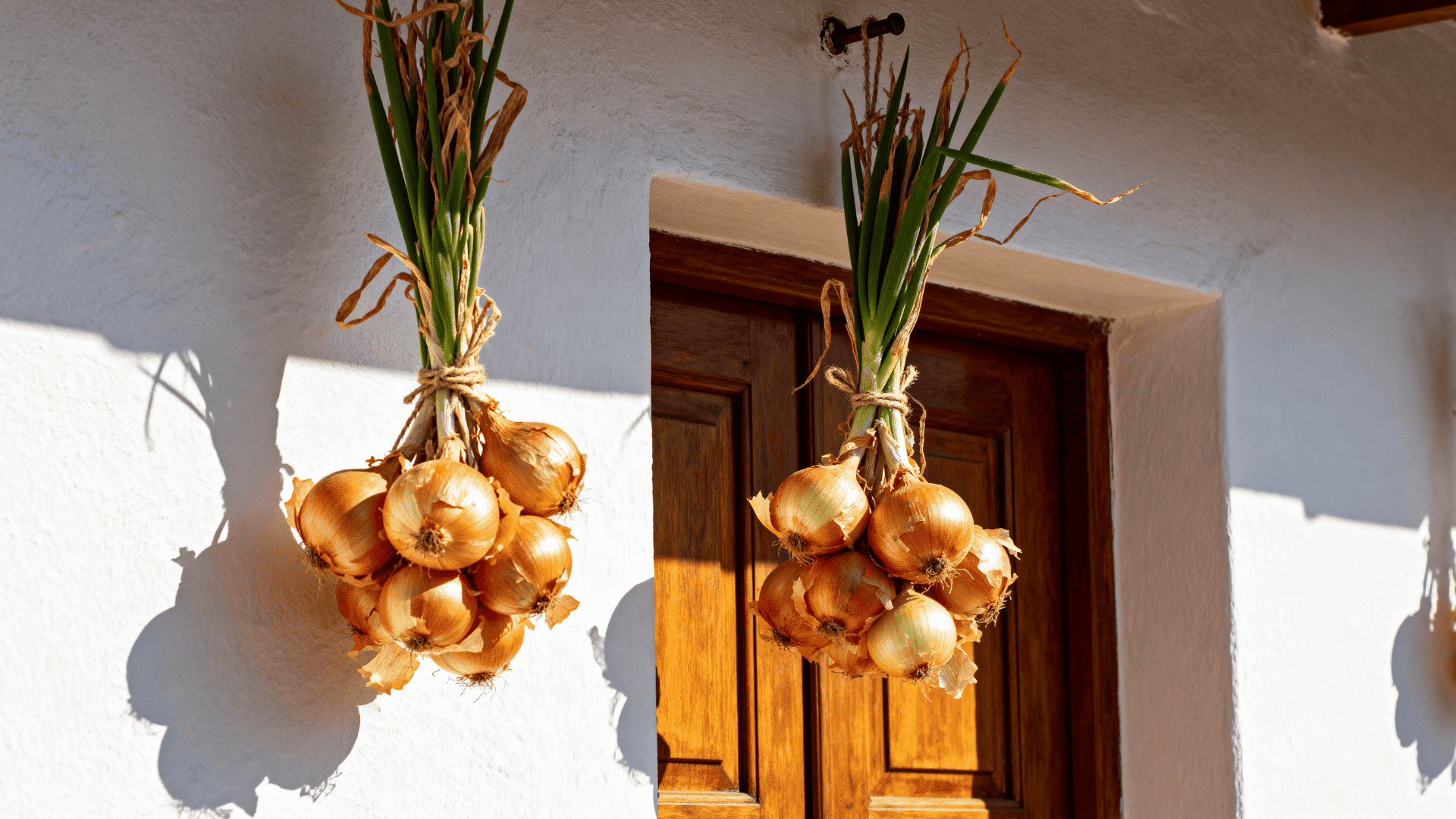 smashing pomegranates and onion bundles in greece