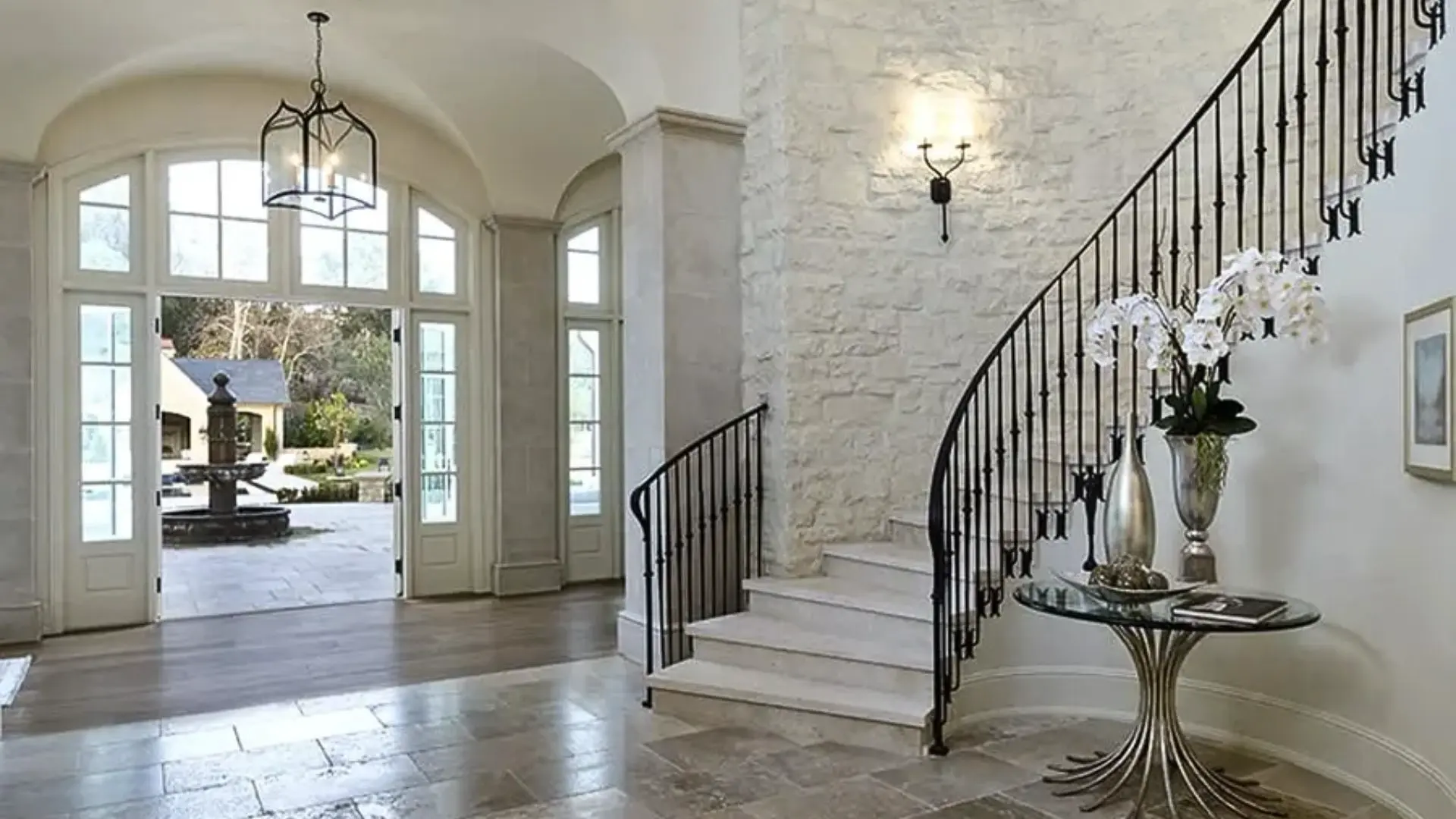Kim Kardashian Hidden Hills minimalist monastery interior, neutral palette living room