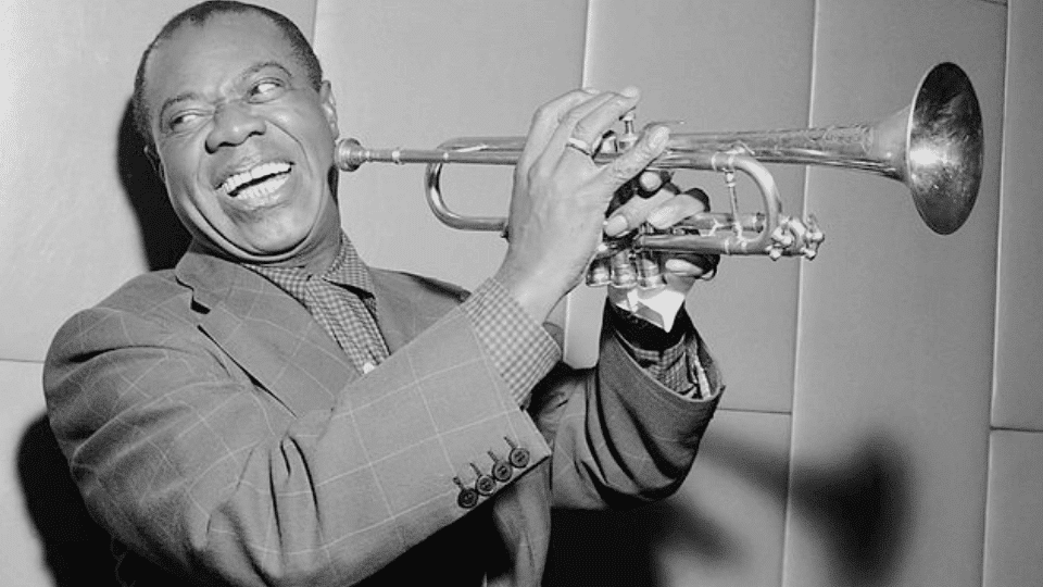 Louis Armstrong playing a trumpet