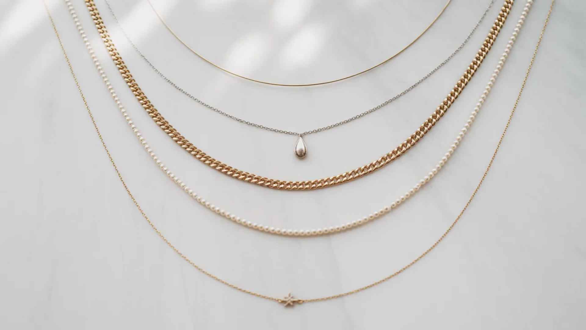 Step by step guide on how to Layer necklaces