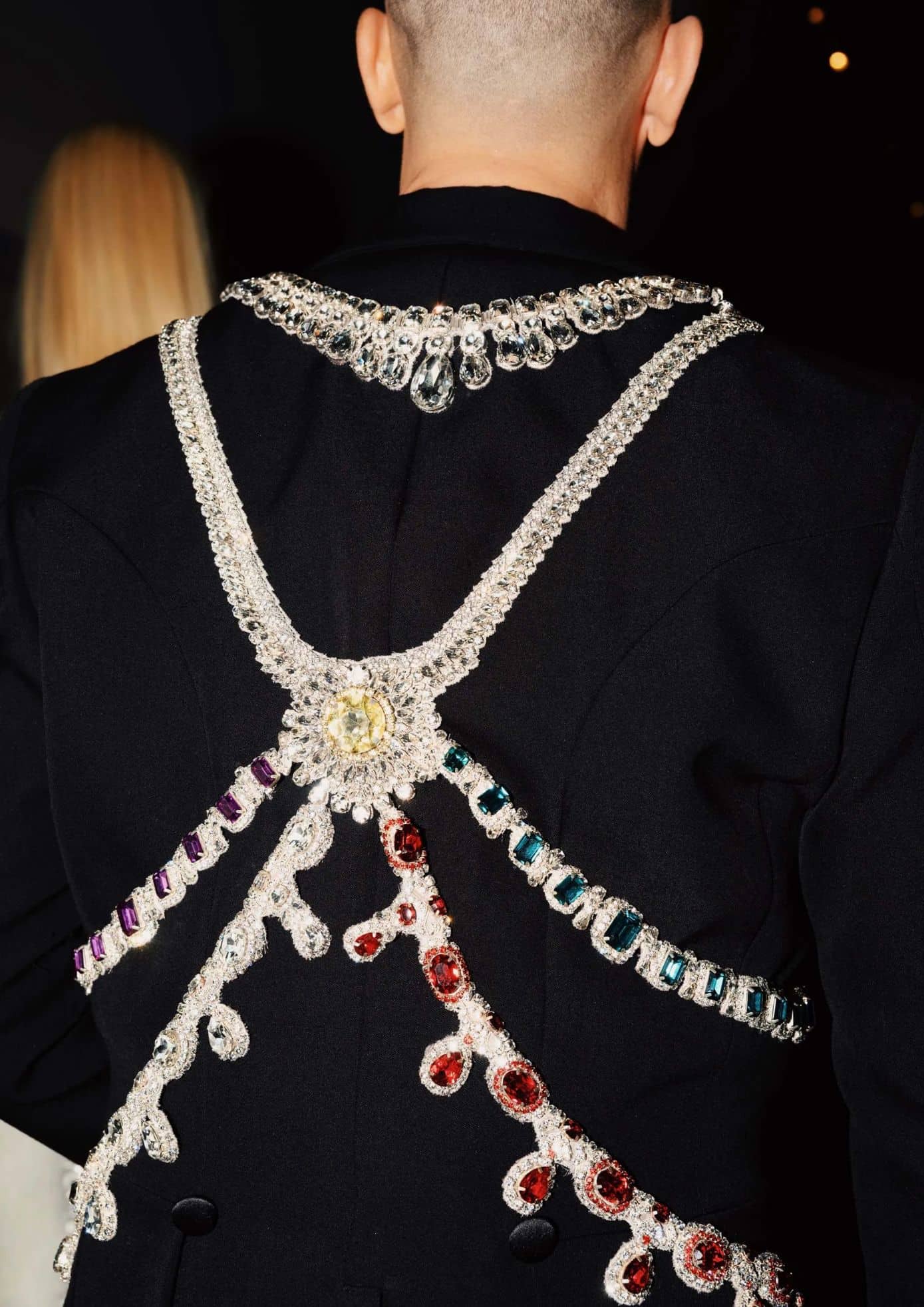 Back of a black suit with intricate gemstone and crystal detailing at the 2019 Met Gala. (1)