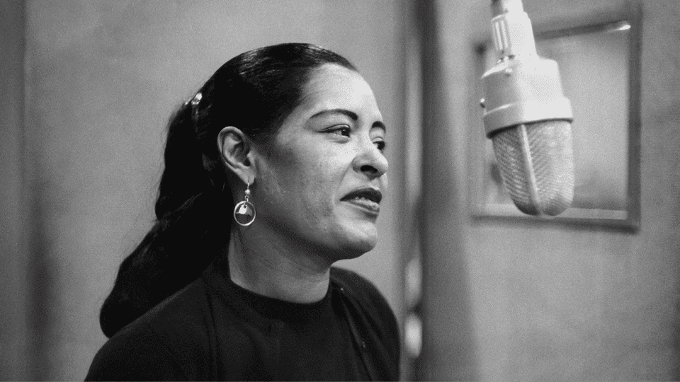 Billie Holiday in a studio recording song