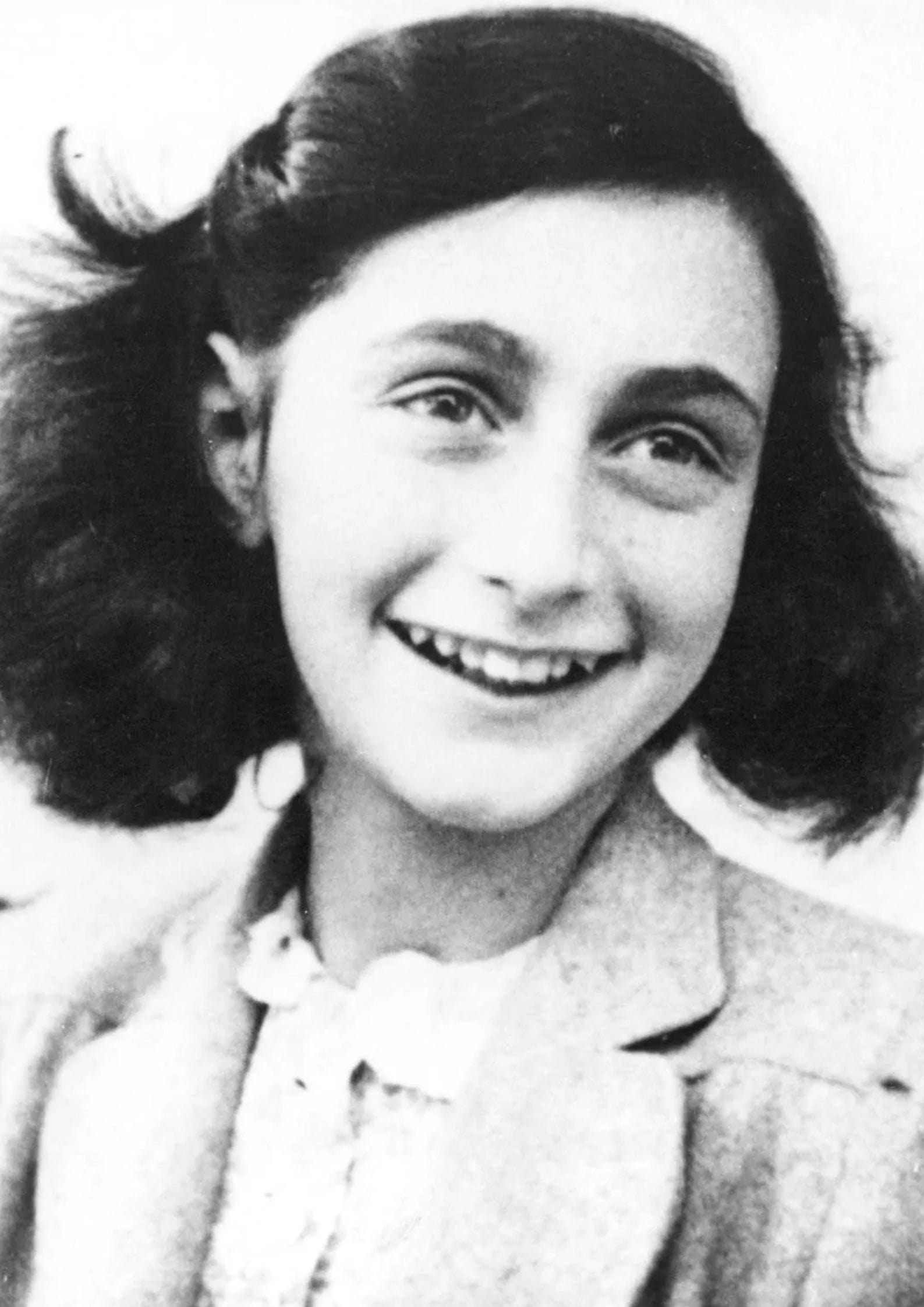 Black and white photograph of Anne Frank, Jewish diarist whose account of hiding during the Holocaust became one of history's most read personal records (1)