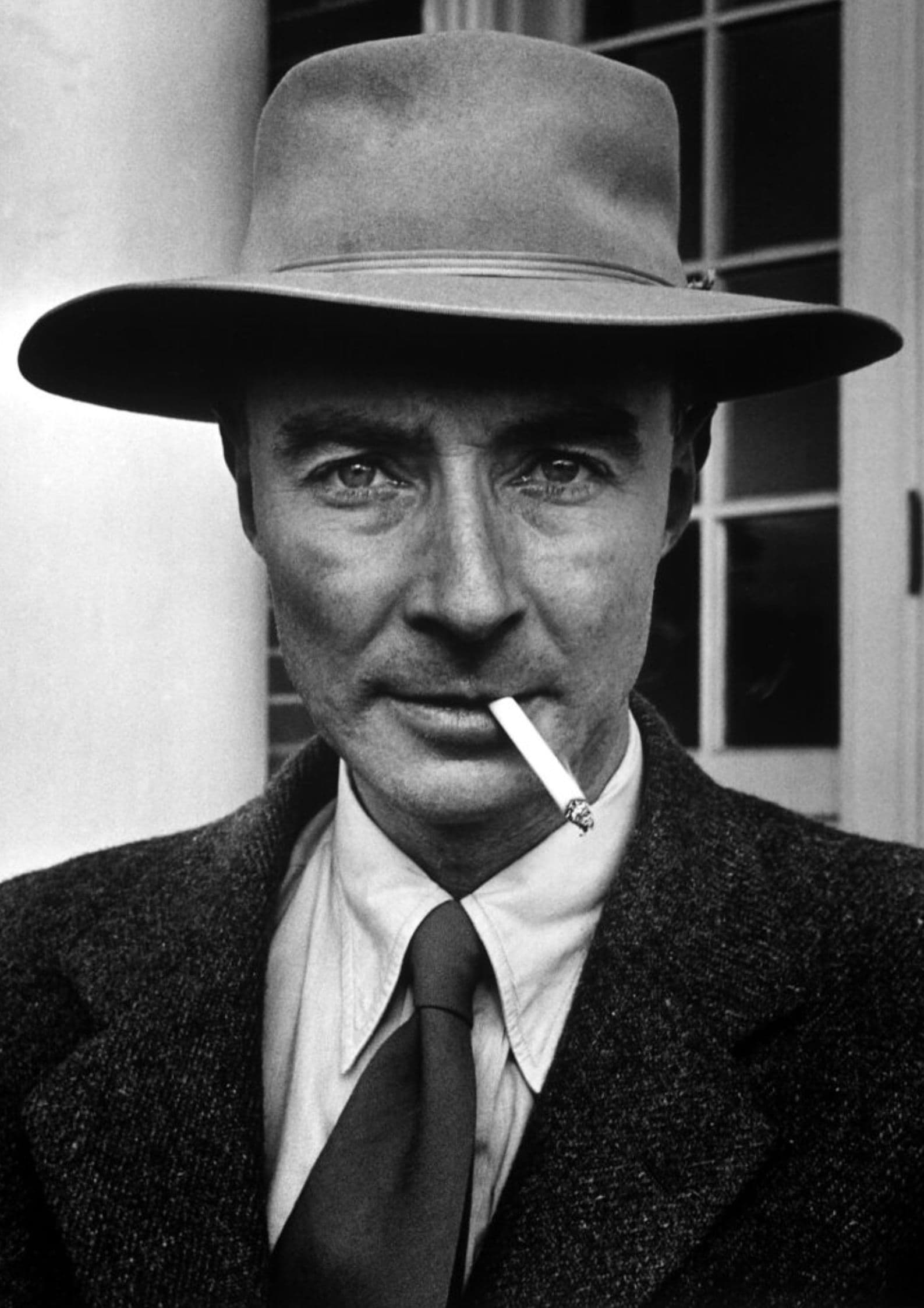 Black and white portrait photograph of J. Robert Oppenheimer, American physicist who directed the Manhattan Project during World War II (1)