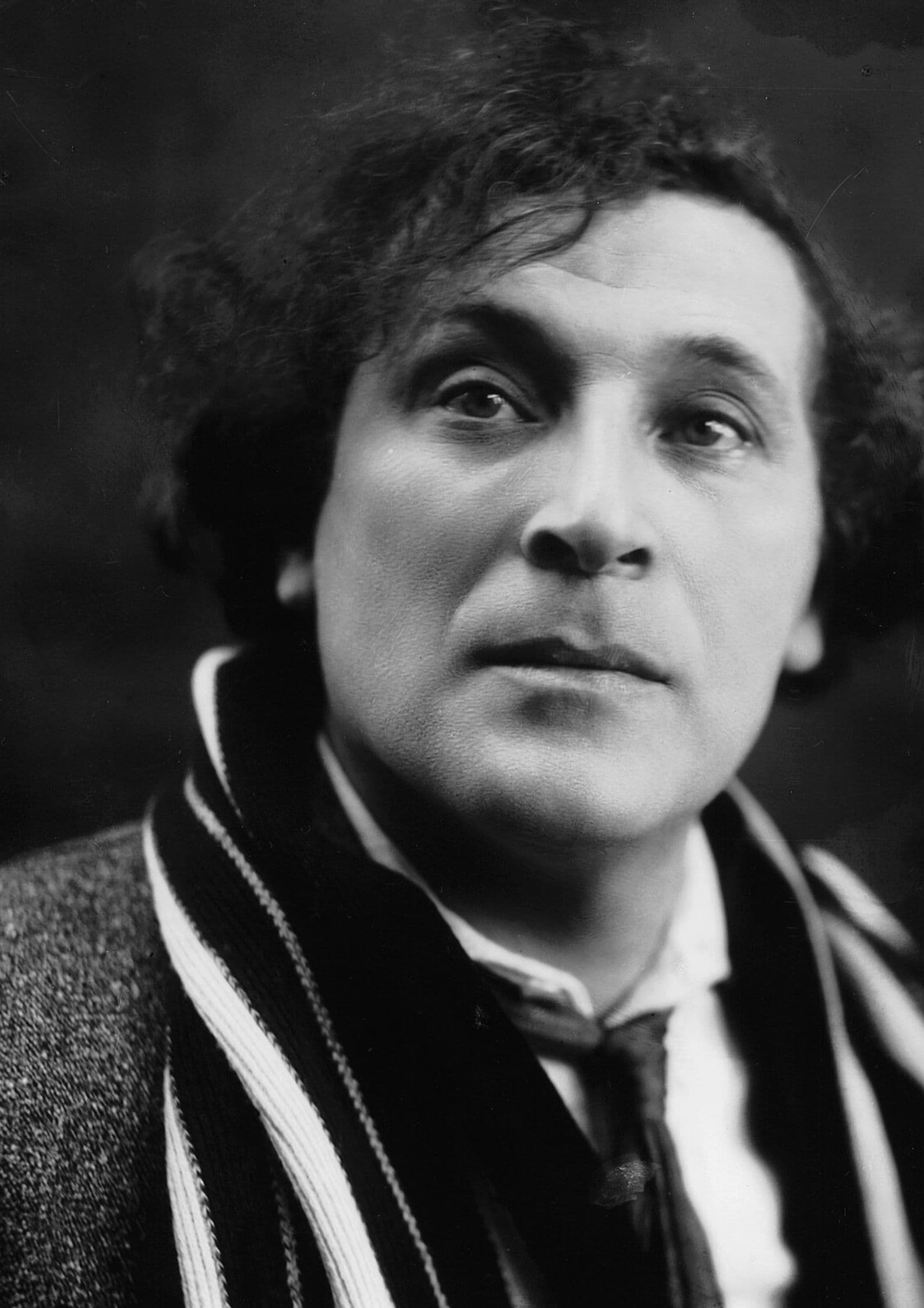 Black and white portrait photograph of Marc Chagall, Russian-Jewish painter known for his dreamlike style and works rooted in Jewish cultural tradition (1)