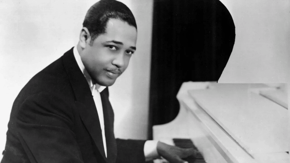 Duke Ellington playing piano
