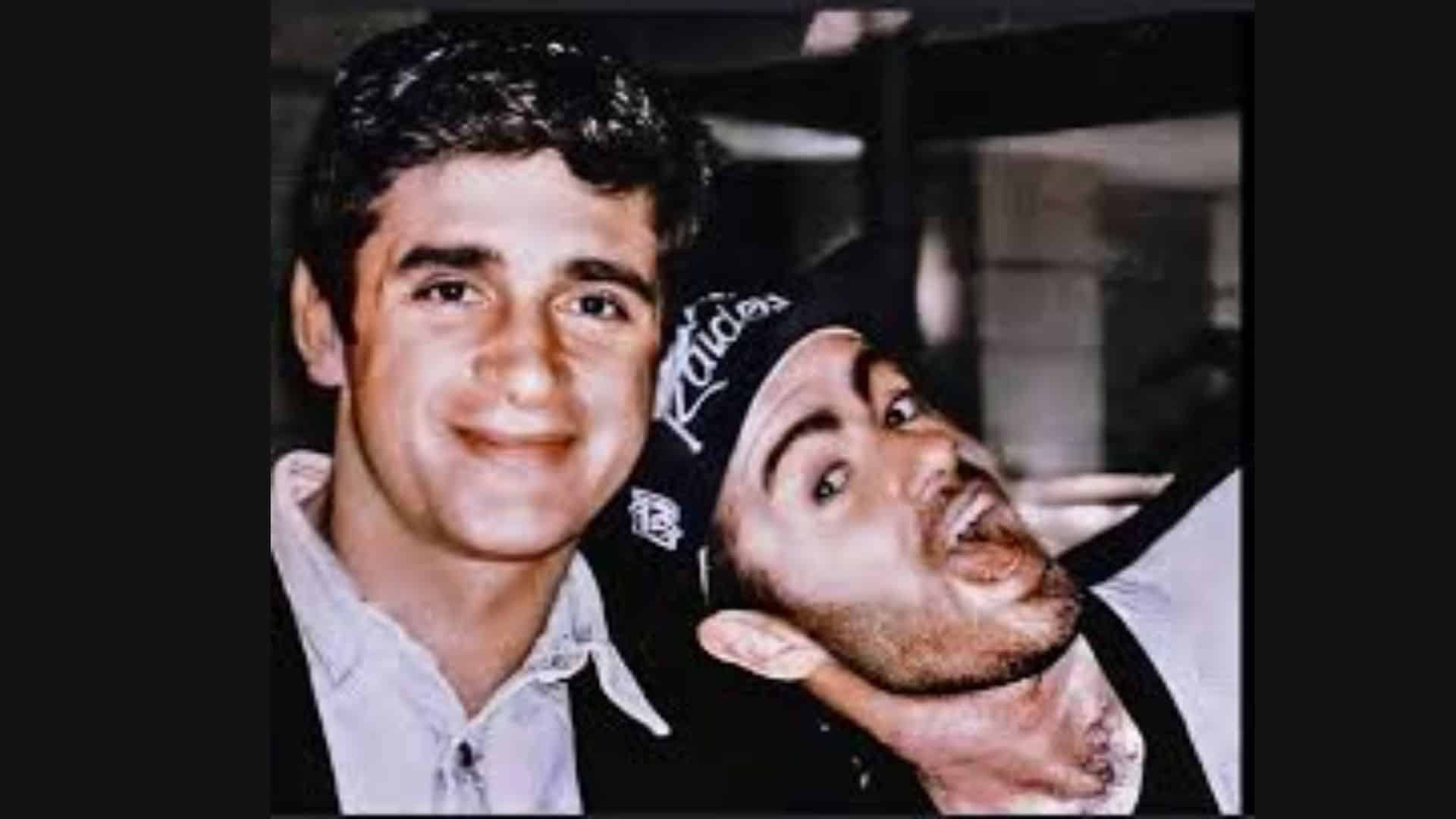 George Michael and Anselmo Feleppa smiling together in a casual candid photo