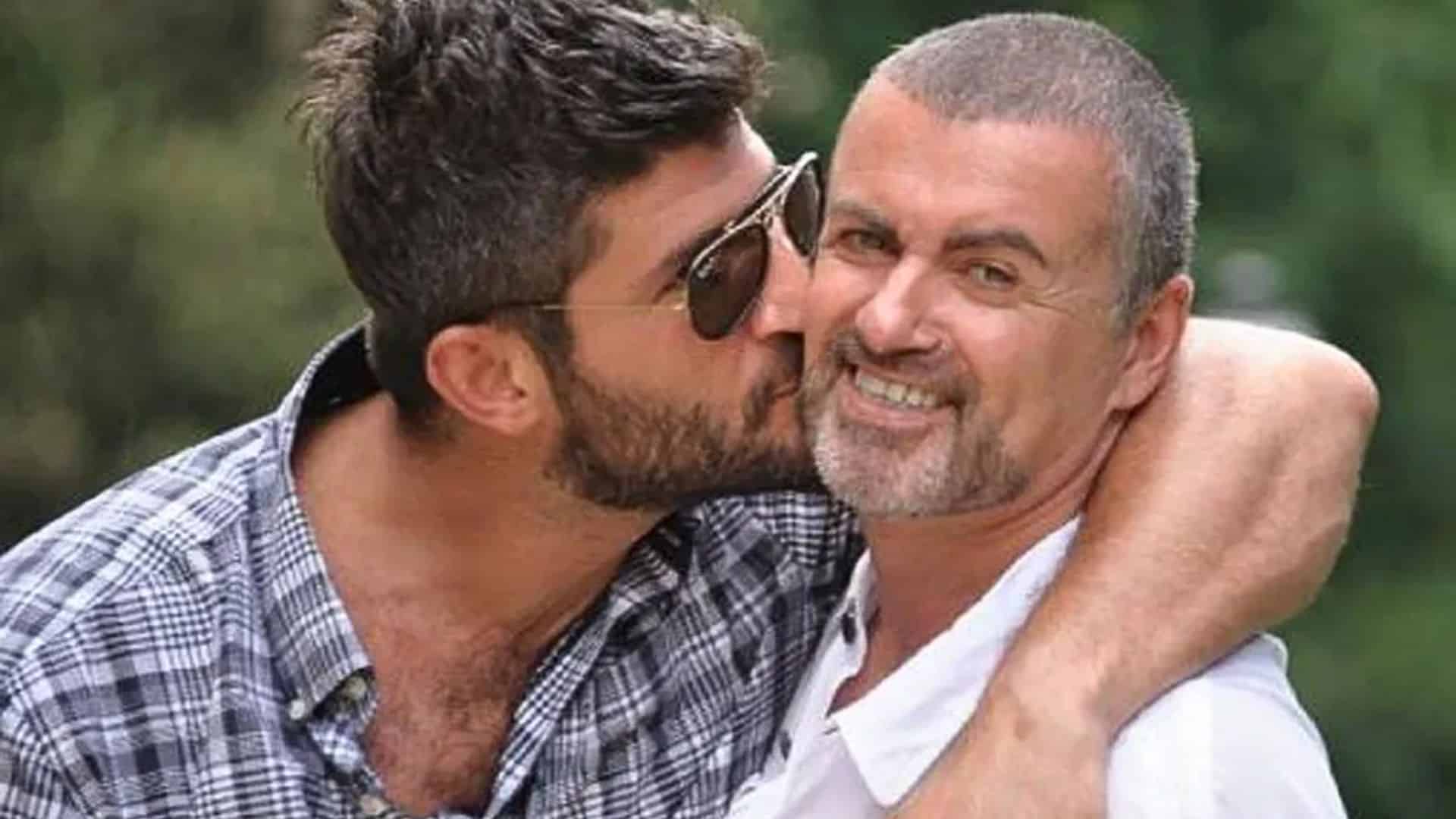 George Michael and Fadi Fawaz smiling together in a casual, candid moment