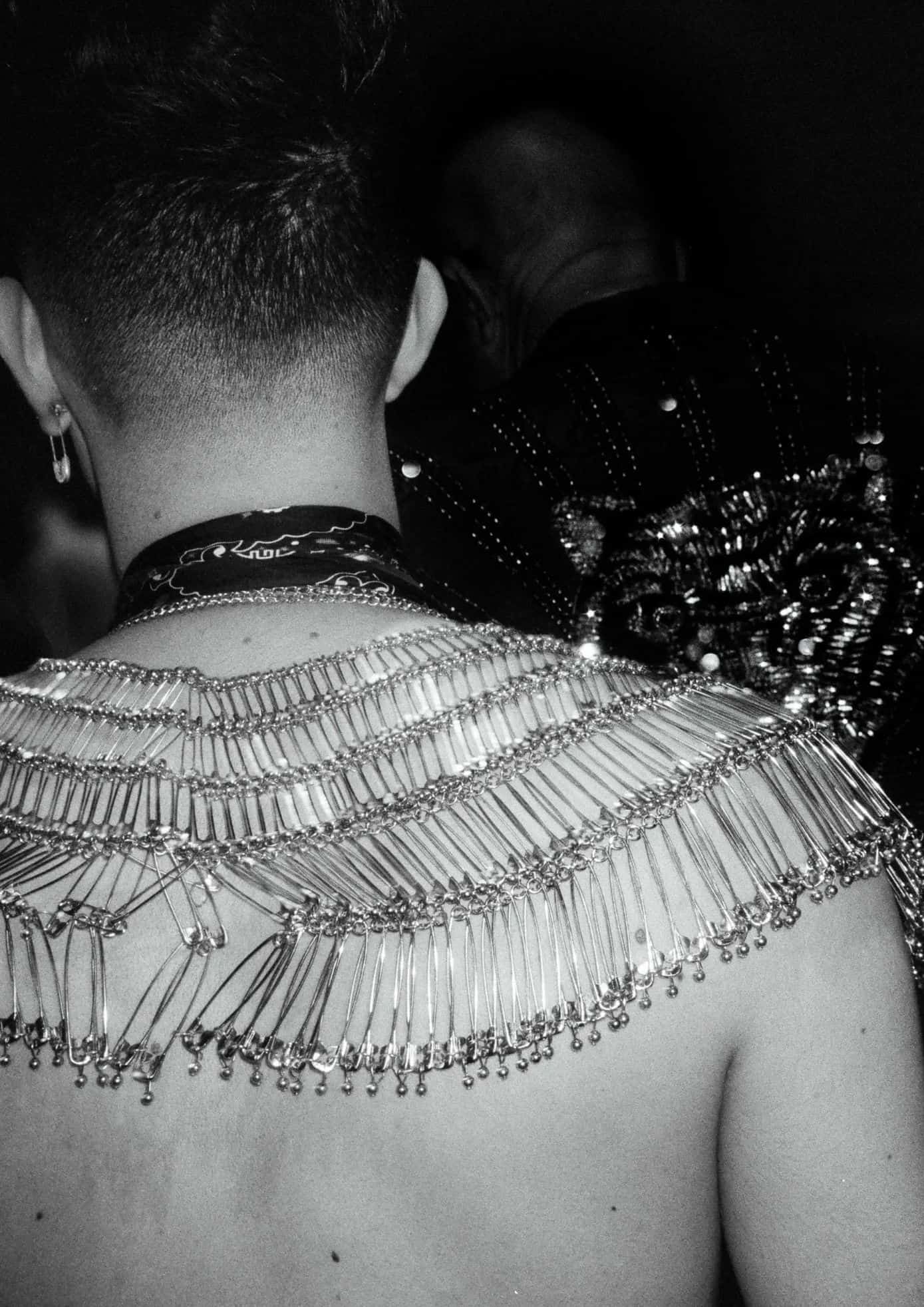 James Charles in a black outfit with safety pins across the shoulders at the 2019 Met Gala. (1)