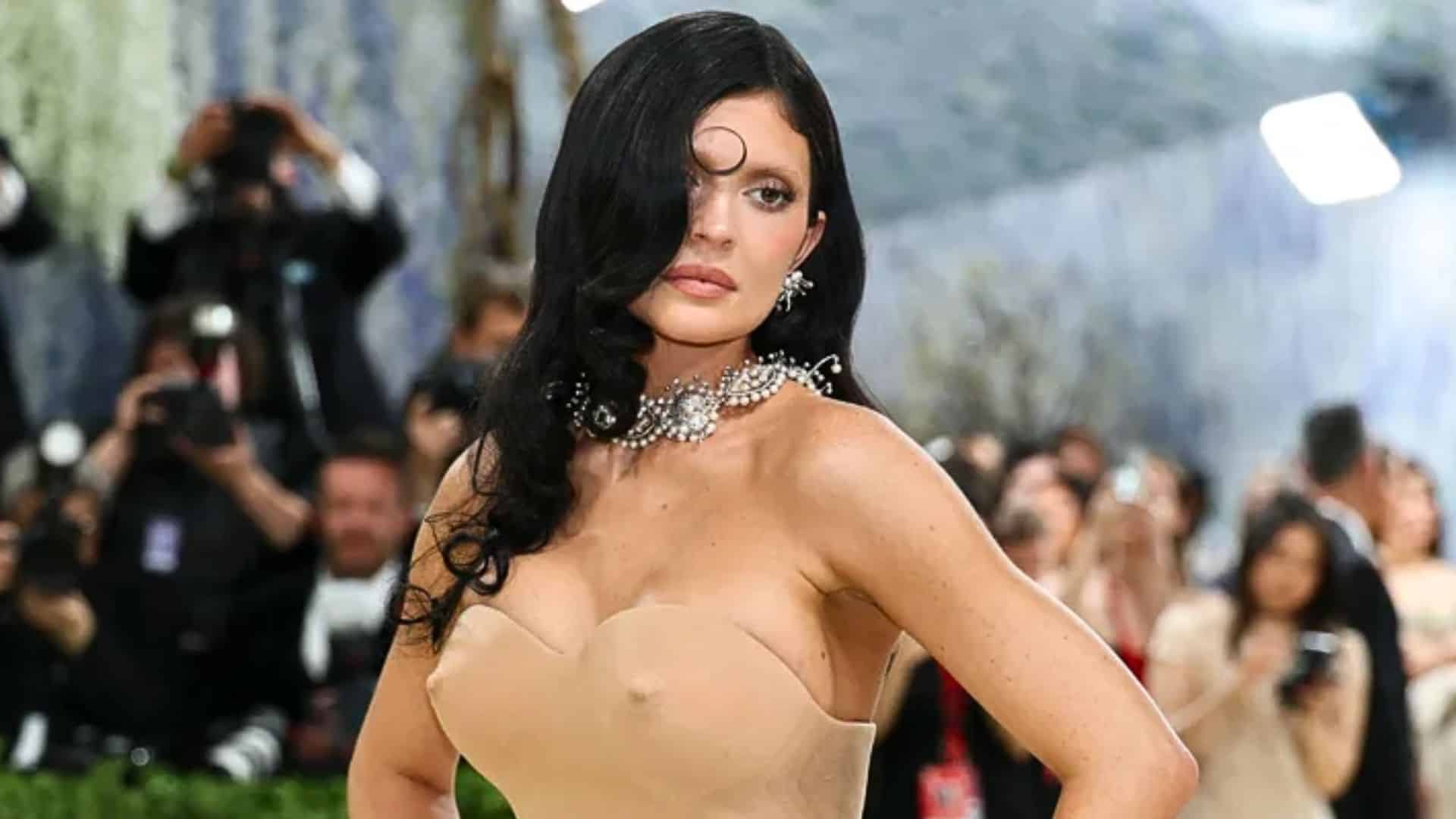 Kylie Jenner wearing a sculpted nude-toned Schiaparelli gown with diamond choker at the Met Gala