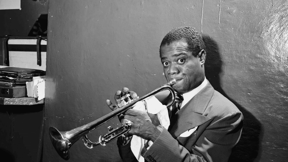 Louis Armstrong playing trumpet